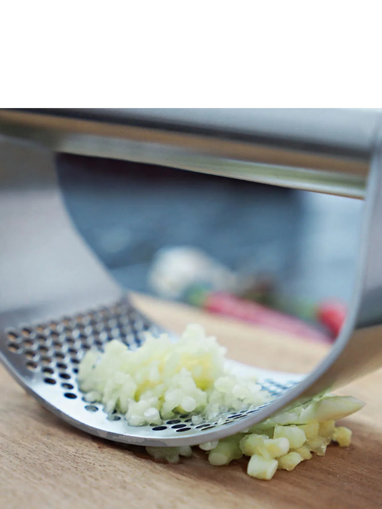 Sharp Garlic Press